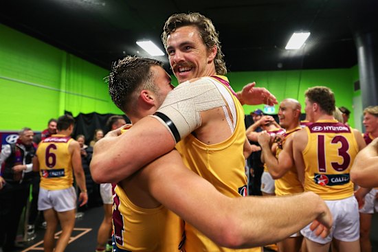 Joe Daniher celebrates the semi final win over GWS with Lachie Neale