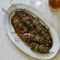 The black vinegar sauce on these Sichuan-style cumin and lamb skewers also serves as a glaze.