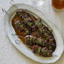 The black vinegar sauce on these Sichuan-style cumin and lamb skewers also serves as a glaze.
