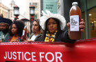 Some of the Brazilian class action claimants taking on BHP stage a demonstrate outside the courtroom on day one.