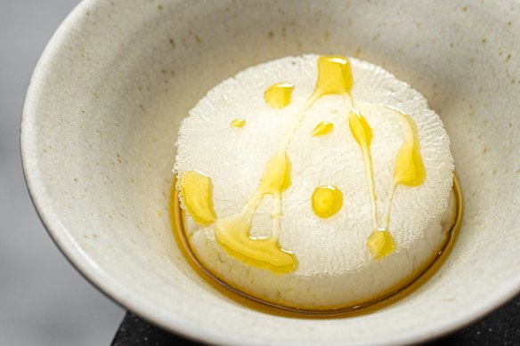 Frozen Pecora Dairy sheep’s yoghurt with aerated Willyama yuzu, toasted bunya nut and preserved essences.