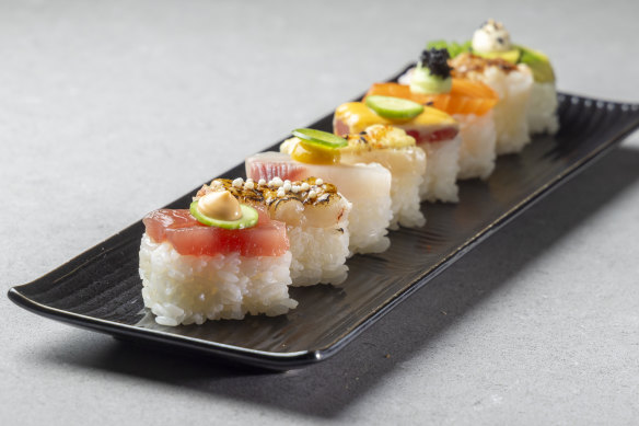 Hako sushi is pressed in a wooden box and sliced into blocks.