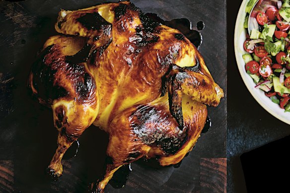 The acid-sweet-umami marinade makes joojeh kabob roast chicken irresistible.