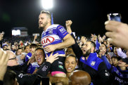 Josh Reynolds is chaired from Belmore Sportsground after his final game for his beloved Bulldogs in 2017.