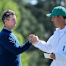 Rory McIlroy and caddie Harry Diamond  shake hands on the 18th after the first round of the 2026 Masters.