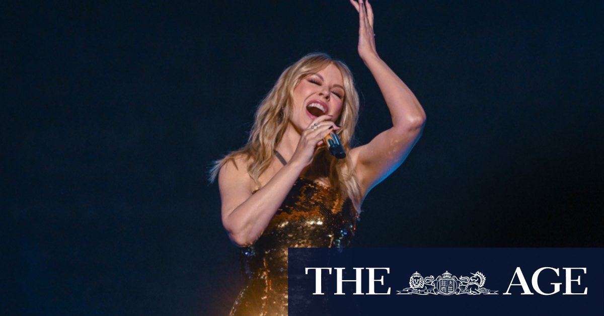 Can’t get you outta my way: Tension as Brisbane fans in wheelchairs struggle to see Kylie