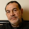 Artist Khaled Sabsabi, who had his invitation to participate in the Venice Biennale revoked by Creative Australia, with his work at Barangaroo Metro Station in Sydney.
