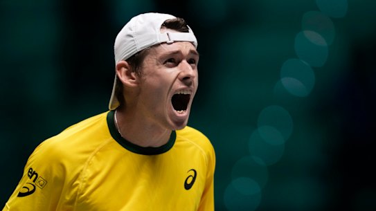 Alex de Minaur celebrates his win.