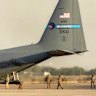 A US Air Force C-130 Hercules military transport aircraft prepares for takeoff from Camp Victory on the outskirts of Baghdad International Airport.