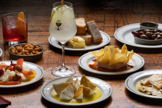 Snacks include the signature chicken liver parfait with potato chips (centre).