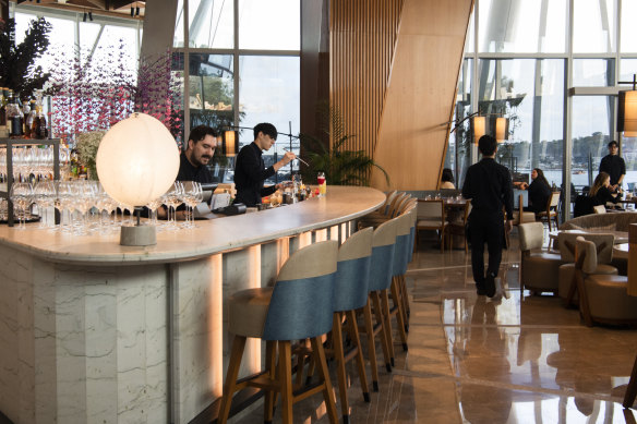 The plush dining room at Nobu Sydney has a central bar and rich textures.