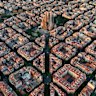 Gaudi’s masterpiece … La Sagrada Familia pierces through the uniform city blocks.
