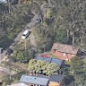 Police have found a mother unconscious, and her two adult sons unresponsive with stab wounds, in Leura.