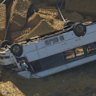 The bus driver was trapped for more than an hour after it rolled in country Victoria.