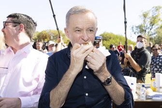 Albo scarfing a snag sanga on the campaign trail recently.