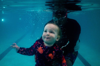  Swim instructor Rajesh Bhardwaj takes 17-month-old James Radman for water safety lessons at Speedo Swim Centre in Bondi Beach.