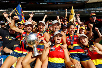 Erin Phillips, Ebony Marinoff, Danielle Ponter, Marijana Rajcic, Stevie-Lee Thompson and Nikki Gore of the Crows celebrate with fans.