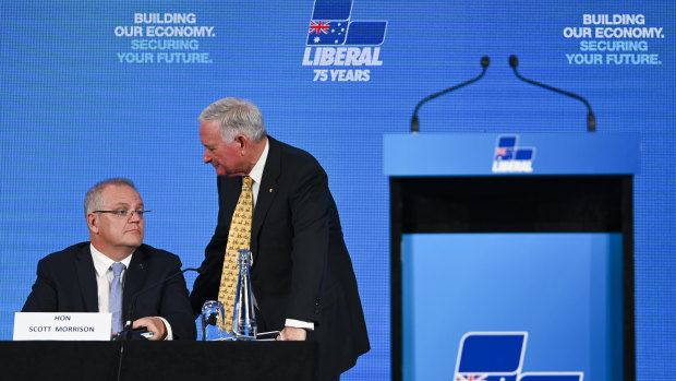 Nick Greiner speaks to Prime Minister Scott Morrison at the Hyatt Hotel in Canberra on Friday.