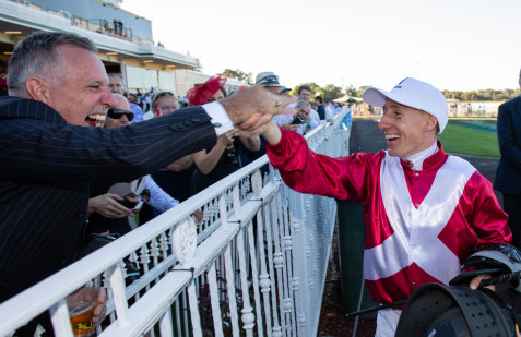 Super Saturday: Jockey William Pike is congratulated after riding Galaxy Star to victory.