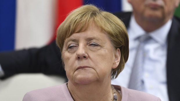 German Chancellor Angela Merkel reacts during the Leader's Special event on Women's Empowerment at the G20 summit. 