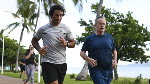Running for office: Bill Shorten and Jonathan Thurston hit the streets in Townsville last month.