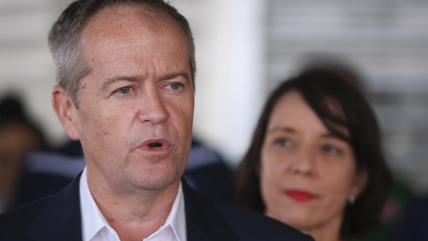 Bill Shorten has refused to rule out reviewing the Adani mine's approval. 