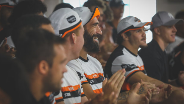 Wests Tigers players cheer the news of David Nofoaluma's re-signing on Thursday
