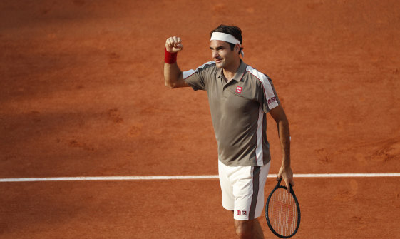 Roger Federer beats Stan Wawrinka in four sets on Tuesday.