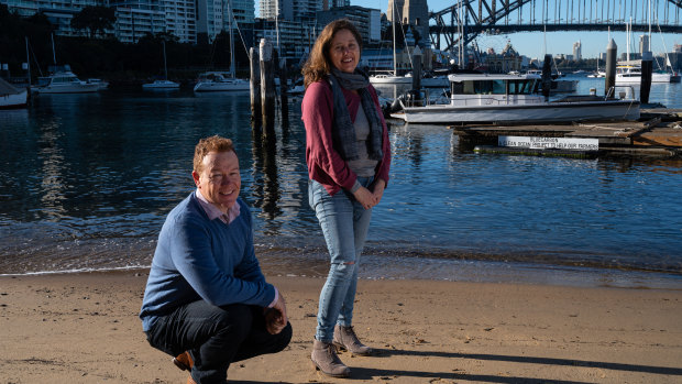 North Sydney councillor Kathy Brodie (right), pictured with local swimmer David Livermore, said she still supported a netted swimming enclosure for North Sydney.