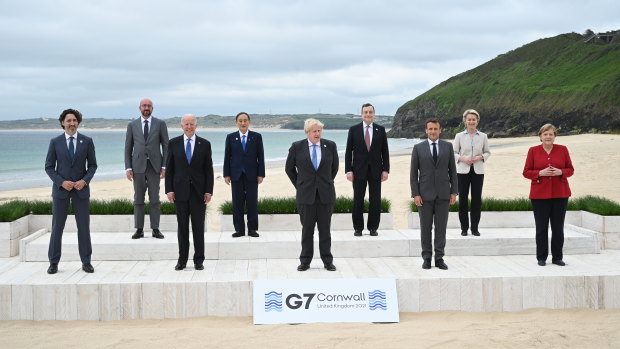World leaders pose for the traditional G7 ‘family photo’ in Carbis Bay. (L-R) Canadian Prime Minister Justin Trudeau, President of the European Council Charles Michel, US President Joe Biden, Japanese Prime Minister Yoshihide Suga, British Prime Minister Boris Johnson, Italian Prime Minister Mario Draghi, French President Emmanuel Macron, President of the European Commission Ursula von der Leyen and German Chancellor Angela Merkel. Australian Prime Minister Scott Morrison is a guest of G7, but Australia is not in the core group. 