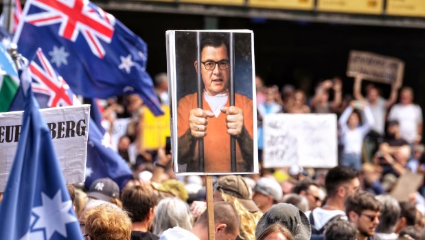 A poster of the Premier behind bars at Saturday’s protest.