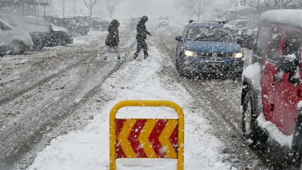 Scenes from Oberon during a heavy snowfall this morning on the NSW Central Tablelands.