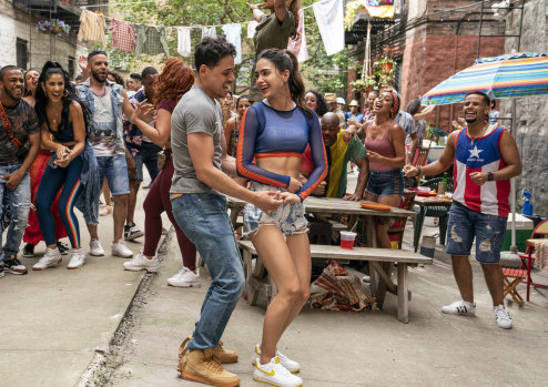 Anthony Ramos as Usnavi and Melissa Barrera as Vanessa in In The Heights.