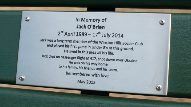 The plaque to Jack on a park bench at his team's ground. 