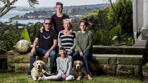 Nick Andrews with wife Juliet,  children James, Alice and Eliza (front) and dogs Banjo and Harley at home in Wentworth Road, Vaucluse.