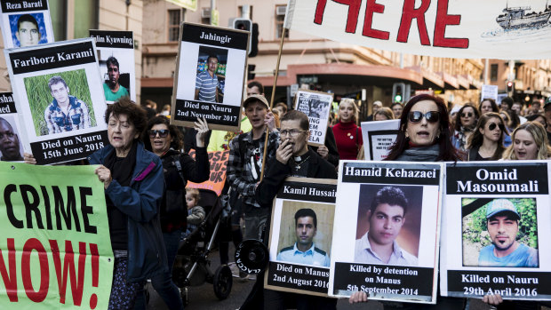 People protest against Australia's asylum seeker policies during a march in Sydney in July.