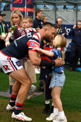 Jared Waerea-Hargreaves celebrates his 300th match with his three children and wife Chelsea.