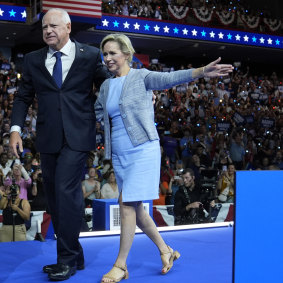 Tim Walz and his wife, Gwen Walz, at a campaign rally in Philadelphia.