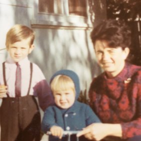 A two-year-old Adrian Piccoli (centre) with his best teacher, his mother Nives, and his brother Dino.