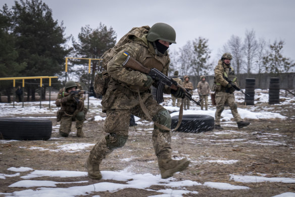 New recruits practise on a military training ground in Chernihiv region, Ukraine, in December.