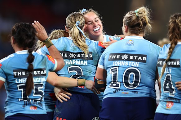 Jubilant NSW players after their game one win.
