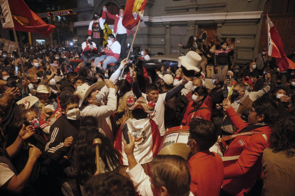 Supporters of Pedro Castillo celebrate after he was declared president-elect of Peru.