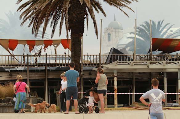 St Kilda locals survey the damage.