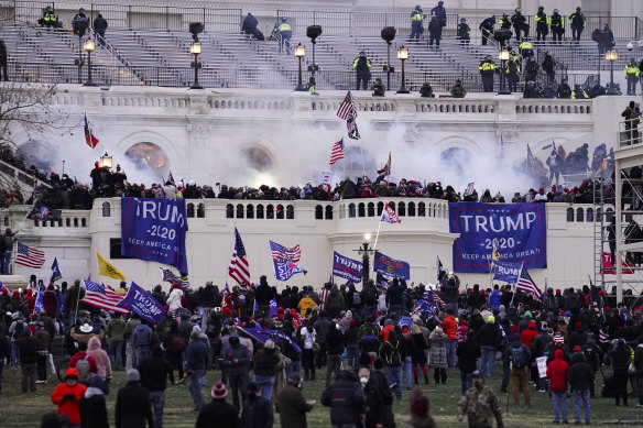 Violent rioters, loyal to then-president Donald Trump, storm the Capitol in Washington, on January 6, 2021. 