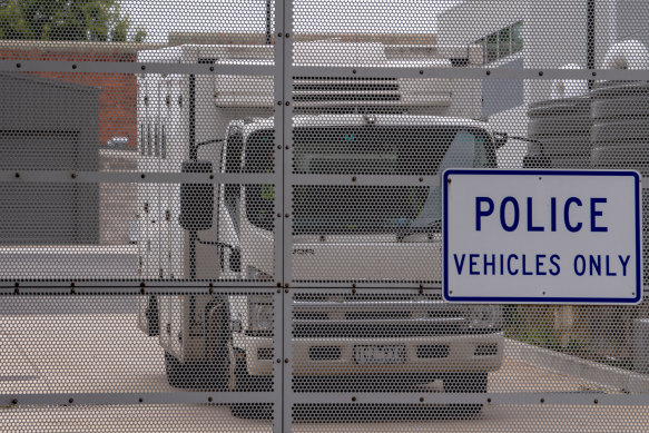 A prison truck leaves Sale police station on November 26.