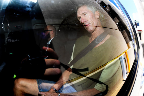 Edward Kenneth Lord in handcuffs as he was taken from the Southport Watchhouse on the Gold Coast in March 2017 for extradition to Tweed Heads.