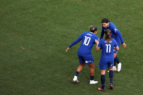 Lauren James of Chelsea celebrates with teammates Sam Kerr and Guro Reiten after scoring the team’s second goal.