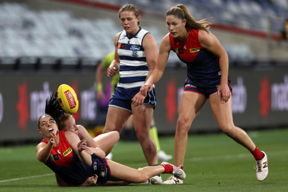 Pressure point: Melbourne’s Sinead Goldrick is tackled by her Geelong opponent. 