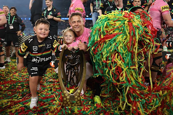 Scott Sorensen poses with the premiership trophy after last year’s grand final.