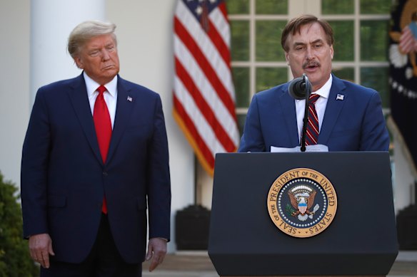 My Pillow chief executive Mike Lindell speaks as President Donald Trump listens during a briefing about the coronavirus at the White House last March.